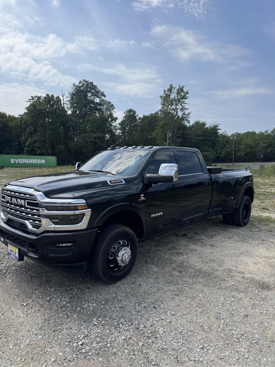 Black Ram dually pickup truck with tinted windows