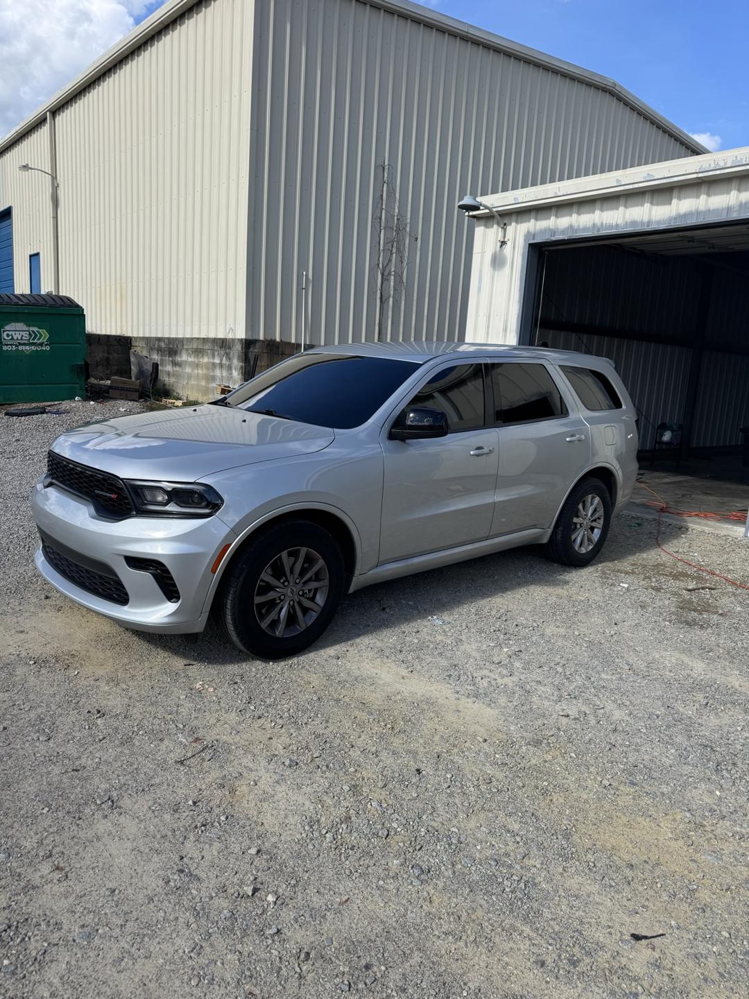 Silver Dodge Durango with tinted windows, front three-quarter view
