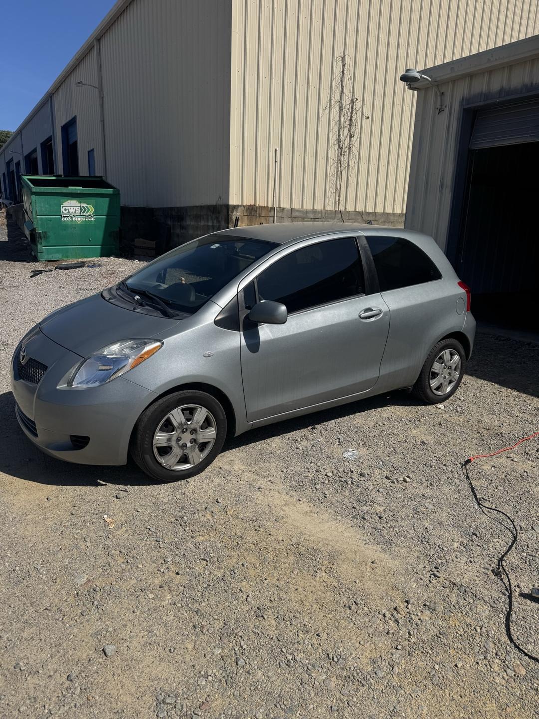 Silver Toyota Yaris hatchback with tinted windows